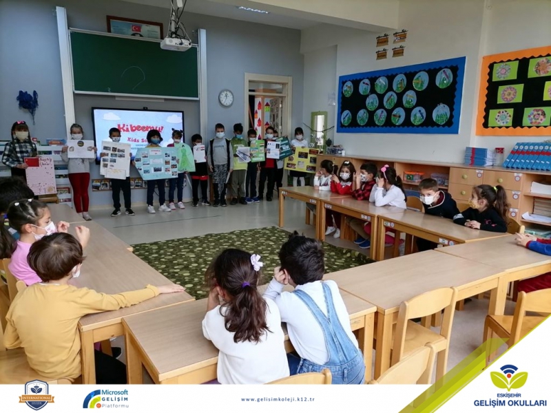 COUNTRY POSTERS PRESENTATION FROM PRIMARY STUDENTS TO THE KINDERGARTENERS